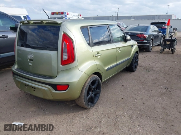 2012 Kia Soul + with VIN KNDJT2A69C7398380, listed as a IAAI auction lot 41523001 with 128,583 mi miles. Bid and sale history available at carsss.com. Image 4.