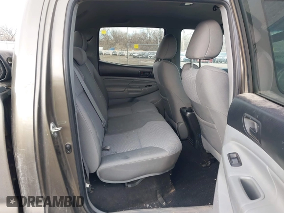 2014 Toyota Tacoma with VIN 3TMMU4FN7EM067182, listed as a IAAI auction lot 41108551 with 156,398 mi miles and . Bid and sale history available at DreamBid. Image 8.