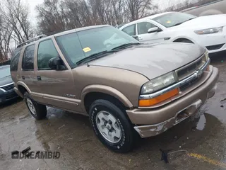 2004 Chevrolet Blazer LS z VIN 1GNDT13X74K133220, wystawiony jako IAAI lot #41708891 z przebiegiem 143 071 mil mil oraz . Historia ofert i sprzedaży dostępna na DreamBid. Obrazek 1.