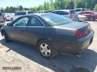 1999 Honda Accord Cpe EX with VIN 1HGCG2250XA012085, listed as a IAAI auction lot 42107661 with 266,736 mi miles. Bid and sale history available at carsss.com. Image 3.