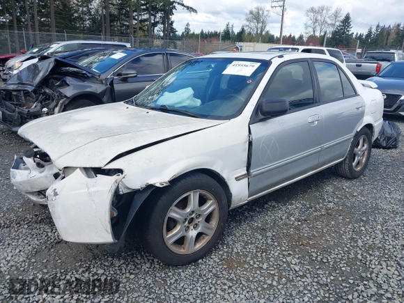 2002 Mazda Protege DX with VIN JM1BJ225520542854, listed as a IAAI auction lot 41955679 with 161,338 mi miles and . Bid and sale history available at DreamBid. Image 2.