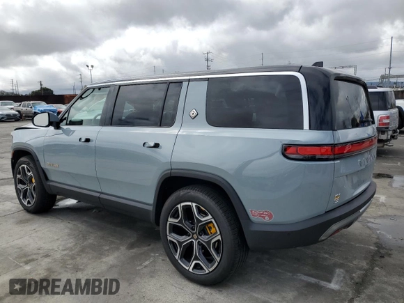 2024 Rivian R1S Adventure with VIN 7PDSGABA7RN038477, listed as a Copart auction lot 48711345 with 0 mi miles and Salvage Title. Bid and sale history available at carsss.com. Image 2.