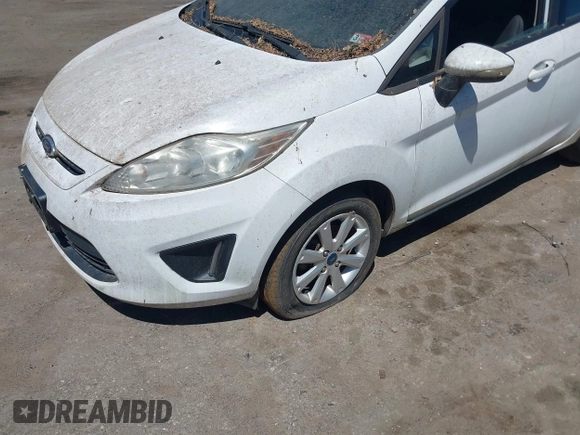 2013 Ford Fiesta SE with VIN 3FADP4EJ0DM109816, listed as a IAAI auction lot 42119360 with 164,397 mi miles and . Bid and sale history available at DreamBid. Image 6.