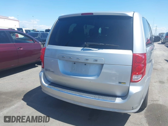 2012 Dodge Grand Caravan SXT with VIN 2C4RDGCG7CR204835, listed as a IAAI auction lot 41948688 with 125,466 mi miles and . Bid and sale history available at DreamBid. Image 16.