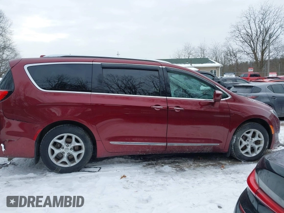 2017 Chrysler Pacifica Touring L Plus with VIN 2C4RC1EG6HR652908, listed as a IAAI auction lot 41381104 with 82,186 mi miles and . Bid and sale history available at DreamBid. Image 14.