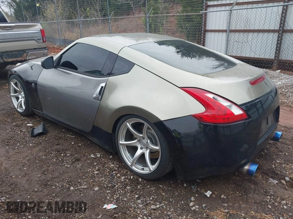 2009 Nissan 370Z Touring with VIN JN1AZ44E69M404341, listed as a IAAI auction lot 41907551 with 144,612 mi miles and . Bid and sale history available at DreamBid. Image 3.