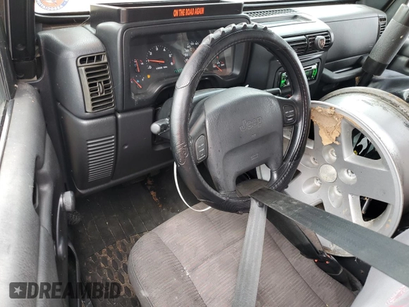 2004 Jeep Wrangler Rubicon z VIN 1J4FA69S24P713388, wystawiony jako Copart lot #61196515 z przebiegiem 155 092 mil mil oraz Czysty tytuł • Clean title. Historia ofert i sprzedaży dostępna na DreamBid. Obrazek 8.