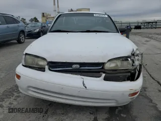 1996 Geo Prizm z VIN 1Y1SK5263TZ061291, wystawiony jako Copart lot #85366554 z przebiegiem 211 051 mil mil oraz Szkody całkowita. Historia ofert i sprzedaży dostępna na DreamBid. Obrazek 5.