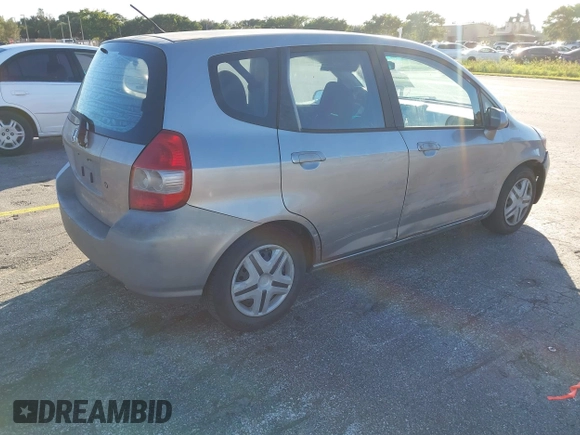 2007 Honda Fit with VIN JHMGD38447S039540, listed as a IAAI auction lot 40985790 with 227,295 mi miles. Bid and sale history available at carsss.com. Image 4.