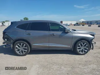 2022 Acura MDX Technology with VIN 5J8YD9H41NL006271, listed as a IAAI auction lot 42602014 with 59,338 mi miles and . Bid and sale history available at DreamBid. Image 14.