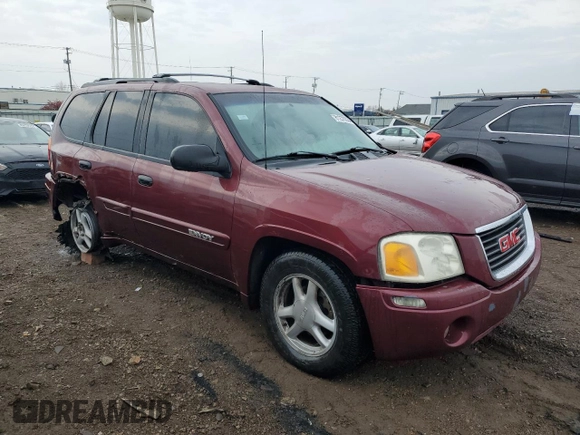 2004 GMC Envoy SLE with VIN 1GKDT13S942218982, listed as a Copart auction lot 81270034 with 197,954 mi miles and Salvage Title. Bid and sale history available at carsss.com. Image 4.