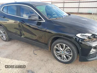 2020 BMW X2 xDrive28i with VIN WBXYJ1C02L5P31038, listed as a IAAI auction lot 41338219 with 72,854 mi miles. Bid and sale history available at carsss.com. Image 6.