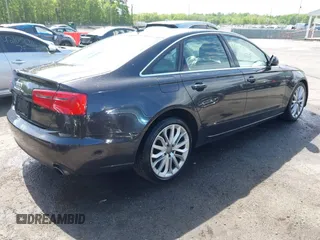 2013 Audi A6 Premium Plus with VIN WAUGFAFC2DN080928, listed as a IAAI auction lot 42141031 with 162,045 mi miles and . Bid and sale history available at DreamBid. Image 4.