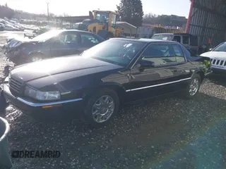 1999 Cadillac Eldorado Touring z VIN 1G6ET129XXU603042, wystawiony jako IAAI lot #41699955 z przebiegiem 81 704 mil mil oraz . Historia ofert i sprzedaży dostępna na DreamBid. Obrazek 18.