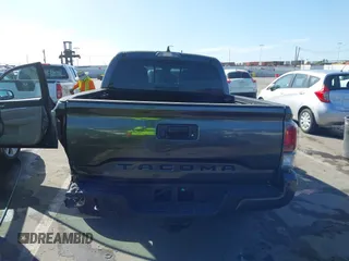 2020 Toyota Tacoma SR5 with VIN 3TMCZ5AN2LM351472, listed as a IAAI auction lot 41621286 with 48,402 mi miles and . Bid and sale history available at DreamBid. Image 16.