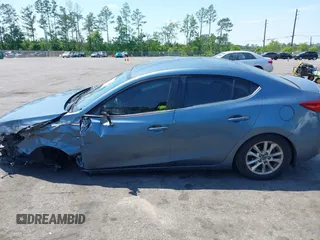 2014 Mazda 3 i Touring with VIN JM1BM1V75E1169909, listed as a IAAI auction lot 42019483 with 221,799 mi miles and . Bid and sale history available at DreamBid. Image 14.