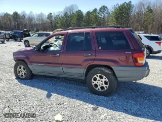 2001 Jeep Grand Cherokee Laredo with VIN 1J4GW48S21C659976, listed as a Copart auction lot 49417965 with 227,644 mi miles and Salvage Title. Bid and sale history available at carsss.com. Image 2.