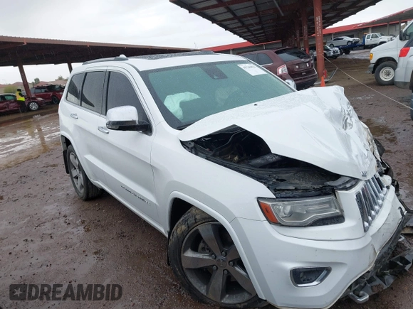 2014 Jeep Grand Cherokee Overland with VIN 1C4RJFCG9EC162098, listed as a IAAI auction lot 41746022 with 120,588 mi miles and . Bid and sale history available at DreamBid. Image 1.