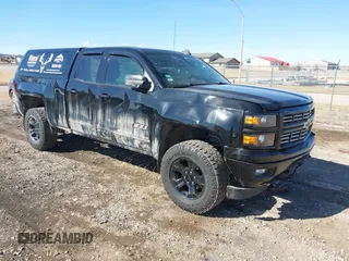 2015 Chevrolet Silverado 1500 LT with VIN 1GCVKREC3FZ332669, listed as a IAAI auction lot 41680418 with 106,095 mi miles. Bid and sale history available at carsss.com. Image 1.