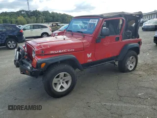 2003 Jeep Wrangler Rubicon z VIN 1J4FA69S53P327630, wystawiony jako Copart lot #71876694 z przebiegiem 100 909 mil mil oraz Nie do naprawy • Non repairable. Historia ofert i sprzedaży dostępna na DreamBid. Obrazek 1.