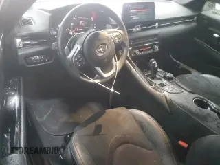 2023 Toyota Supra z VIN WZ1DB2G09PW056248, wystawiony jako Copart lot #51995165 z przebiegiem 20 176 mil mil oraz Szkody całkowita. Historia ofert i sprzedaży dostępna na DreamBid. Obrazek 8.