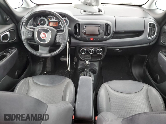 2014 FIAT 500L Lounge with VIN ZFBCFACHXEZ024704, listed as a Copart auction lot 43133285 with 111,279 mi miles and Salvage Title. Bid and sale history available at DreamBid. Image 8.