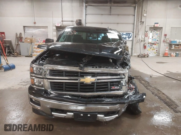 2015 Chevrolet Silverado 1500 LT with VIN 1GCVKREC2FZ417244, listed as a IAAI auction lot 41267554 with 87,735 mi miles and . Bid and sale history available at DreamBid. Image 12.