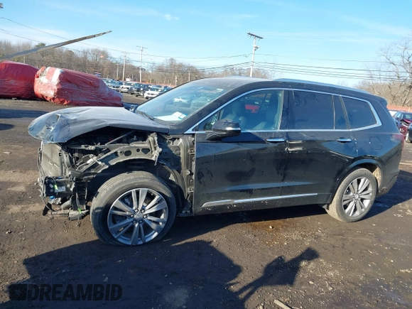 2023 Cadillac XT6 FWD Premium Luxury with VIN 1GYKPCRS1PZ105964, listed as a IAAI auction lot 41525039 with 70,603 mi miles and . Bid and sale history available at DreamBid. Image 14.
