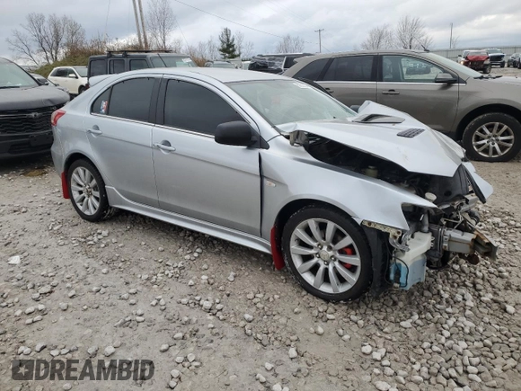 2010 Mitsubishi Lancer with VIN JA32Y6HV9AU002911, listed as a Copart auction lot 83633024 with Not Provided miles and Clean Title. Bid and sale history available at DreamBid. Image 4.