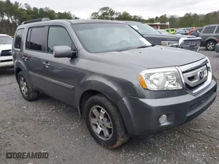 2009 Honda Pilot Touring with VIN 5FNYF38829B023601, listed as a IAAI auction lot 41244261 with 183,189 mi miles. Bid and sale history available at carsss.com. Image 1.