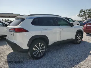 2022 Toyota Corolla Cross XLE с VIN 7MUDAAAG1NV023474, выставлен на аукционе Copart как лот 58534475 с пробегом 7 125 миль миль и Списание • Salvage title. История ставок и продаж доступна на DreamBid. Изображение 3.