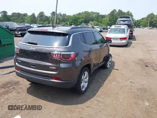 2019 Jeep Compass Altitude with VIN 3C4NJDBB1KT734970, listed as a IAAI auction lot 42483357 with 59,425 mi miles and . Bid and sale history available at DreamBid. Image 4.