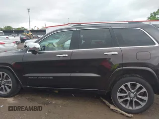 2017 Jeep Grand Cherokee Overland z VIN 1C4RJFCG7HC800403, wystawiony jako IAAI lot #42309664 z przebiegiem 98 389 mil mil oraz . Historia ofert i sprzedaży dostępna na DreamBid. Obrazek 15.