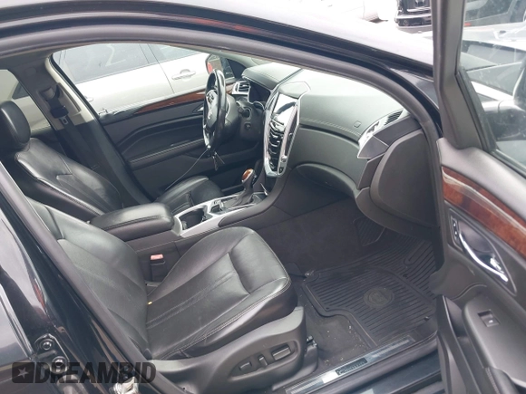 2013 Cadillac SRX Luxury Collection with VIN 3GYFNCE36DS537254, listed as a IAAI auction lot 42136676 with 177,459 mi miles. Bid and sale history available at carsss.com. Image 5.