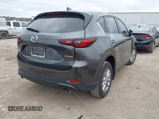 2023 Mazda CX-5 2.5 S Select Package with VIN JM3KFBBMXP0237017, listed as a IAAI auction lot 41207448 with 26,345 mi miles. Bid and sale history available at carsss.com. Image 4.