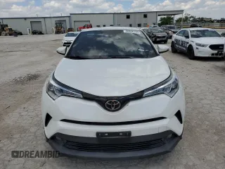 2018 Toyota C-HR XLE z VIN NMTKHMBX7JR035814, wystawiony jako Copart lot #56830125 z przebiegiem 106 843 mil mil oraz Czysty tytuł • Clean title. Historia ofert i sprzedaży dostępna na DreamBid. Obrazek 5.
