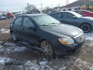2007 Kia Spectra EX with VIN KNAFE122X75454914, listed as a IAAI auction lot 41711981 with 179,382 mi miles. Bid and sale history available at carsss.com. Image 1.