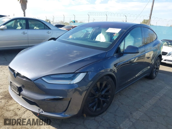 2023 Tesla Model X with VIN 7SAXCBE50PF378548, listed as a IAAI auction lot 41698357 with Not Provided miles and . Bid and sale history available at DreamBid. Image 19.
