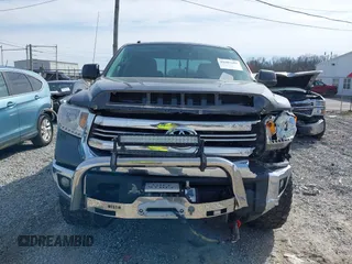 2016 Toyota Tundra 4WD Truck SR with VIN 5TFUW5F19GX548996, listed as a IAAI auction lot 41607605 with 101,194 mi miles. Bid and sale history available at carsss.com. Image 12.