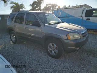 2002 Mazda Tribute LX with VIN 4F2YU091X2KM22268, listed as a Copart auction lot 82915484 with 70,684 mi miles and Clean Title. Bid and sale history available at carsss.com. Image 4.
