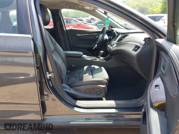 2014 Chevrolet Impala LT with VIN 2G1125S36E9156519, listed as a IAAI auction lot 42145424 with 97,755 mi miles and . Bid and sale history available at DreamBid. Image 5.