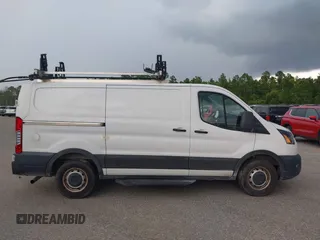 2020 Ford Transit Cargo with VIN 1FTBR1Y8XLKA19646, listed as a IAAI auction lot 42633323 with 82,577 mi miles and . Bid and sale history available at DreamBid. Image 13.