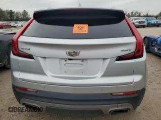 2020 Cadillac XT4 FWD Premium Luxury with VIN 1GYFZCR44LF099246, listed as a Copart auction lot 41861735 with 98,018 mi miles and Salvage title. Bid and sale history available at DreamBid. Image 6.