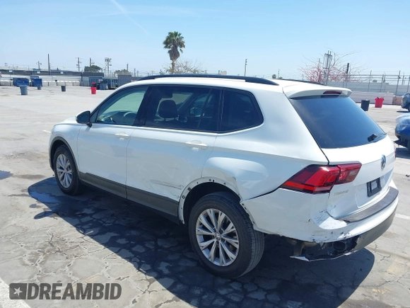 2019 Volkswagen Tiguan S with VIN 3VV1B7AX1KM101407, listed as a IAAI auction lot 42032761 with 51,868 mi miles and . Bid and sale history available at DreamBid. Image 3.