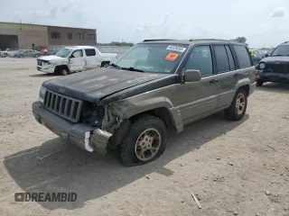 1996 Jeep Grand Cherokee Limited с VIN 1J4GZ78S3TC395758, выставлен на аукционе Copart как лот 60326205 с пробегом Не указан миль и Списание • Salvage title. История ставок и продаж доступна на DreamBid. Изображение 1.