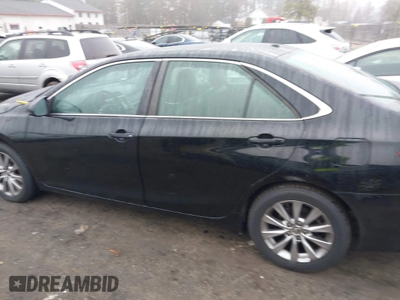 2015 Toyota Camry XLE with VIN 4T4BF1FK7FR500214, listed as a IAAI auction lot 41901003 with 64,771 mi miles and . Bid and sale history available at DreamBid. Image 13.