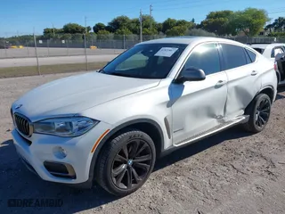 2016 BMW X6 xDrive35i with VIN 5UXKU2C57G0N81974, listed as a IAAI auction lot 41821867 with 144,643 mi miles. Bid and sale history available at carsss.com. Image 18.