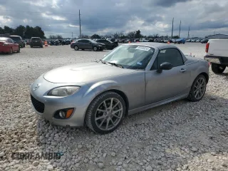 2009 Mazda MX-5 Miata Grand Touring with VIN JM1NC26F390204504, listed as a Copart auction lot 86556924 with 134,027 mi miles and Salvage title. Bid and sale history available at DreamBid. Image 1.