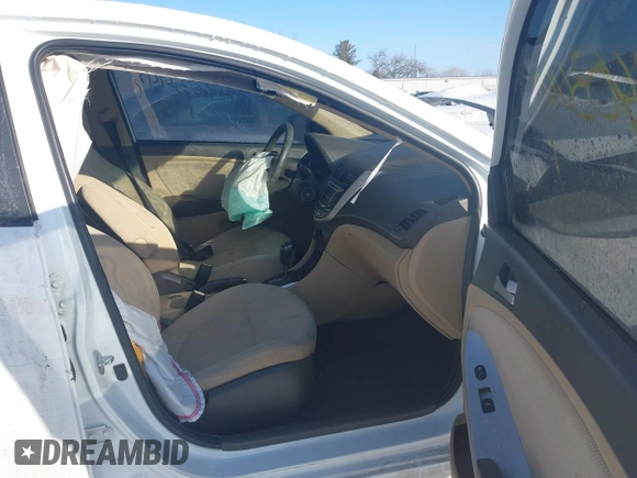 2013 Hyundai Accent GLS z VIN KMHCT4AE5DU484764, wystawiony jako IAAI lot #41403447 z przebiegiem 144 997 mil mil oraz . Historia ofert i sprzedaży dostępna na DreamBid. Obrazek 5.
