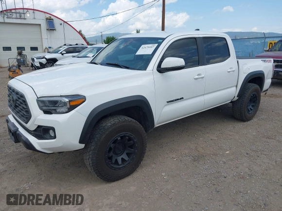 2022 Toyota Tacoma SR with VIN 3TMCZ5AN1NM478457, listed as a IAAI auction lot 42479107 with 59,547 mi miles and . Bid and sale history available at DreamBid. Image 19.